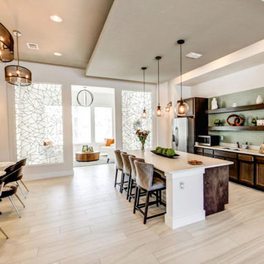 Modern open space kitchen with bar & stools